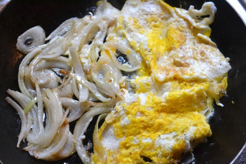 fried egg and onion sandwich